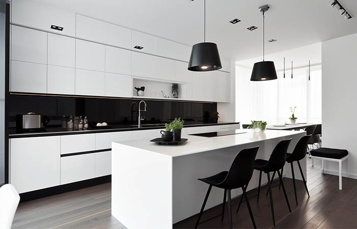 modern white kitchen cabinets with dark floor