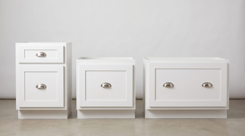 Cabinet Pull Placement Guide for Doors and Drawers Three drawer sizes showing single centred pull upper third placement and two pull wide drawer configuration